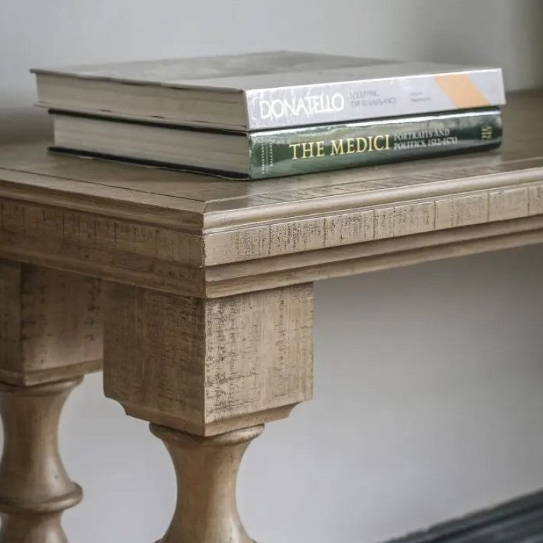 Close up of the West Coast Accent Wooden Console Table leg and top corner. Showing the beautiful caved detail of the wooden console table  and square frame of the top of the leg